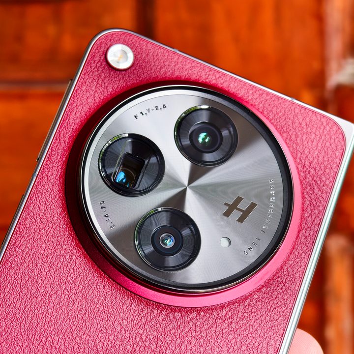 Close up of the camera module on the OnePlus Open Apex Edition Crimson Shadow red.