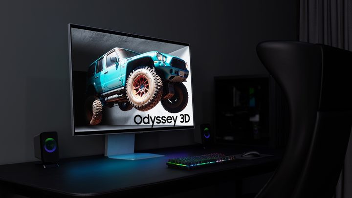 The Samsung Odyssey 3D monitor placed on a desk.