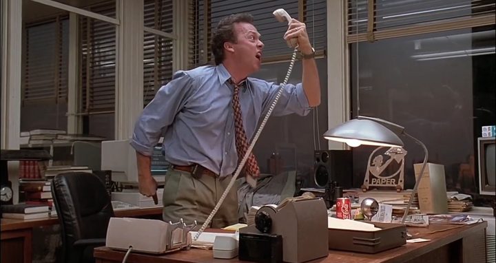 Michael Keaton screaming to a telephone in "The Paper."