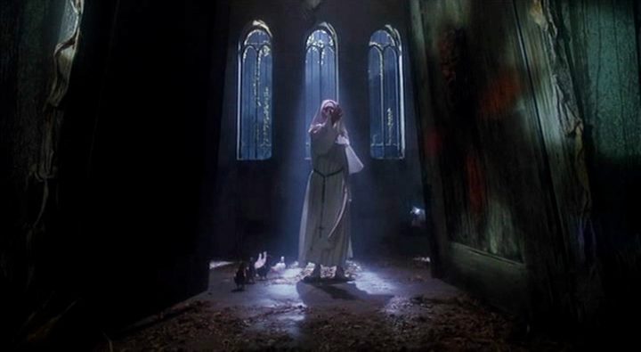 A nun stands in a church in A Nightmare on Elm Street 5: The Dream Child.