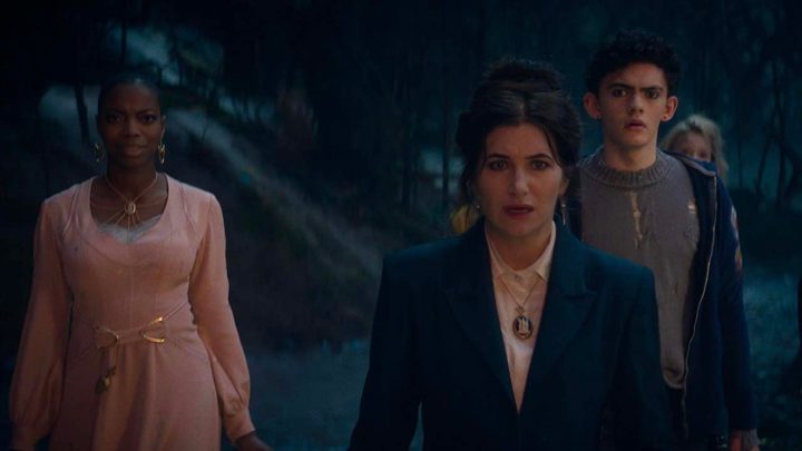 Agatha looking stunned, a young man and woman behind her, in a scene from Agatha All Along.