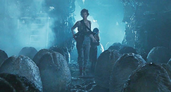 Ripley and Newt walk into an alien's nest in Aliens.