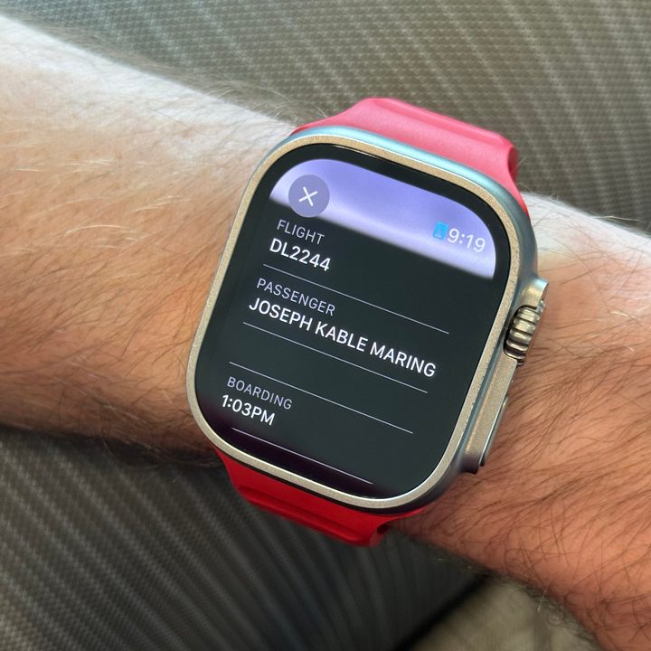 A boarding pass on an Apple Watch Ultra 2.