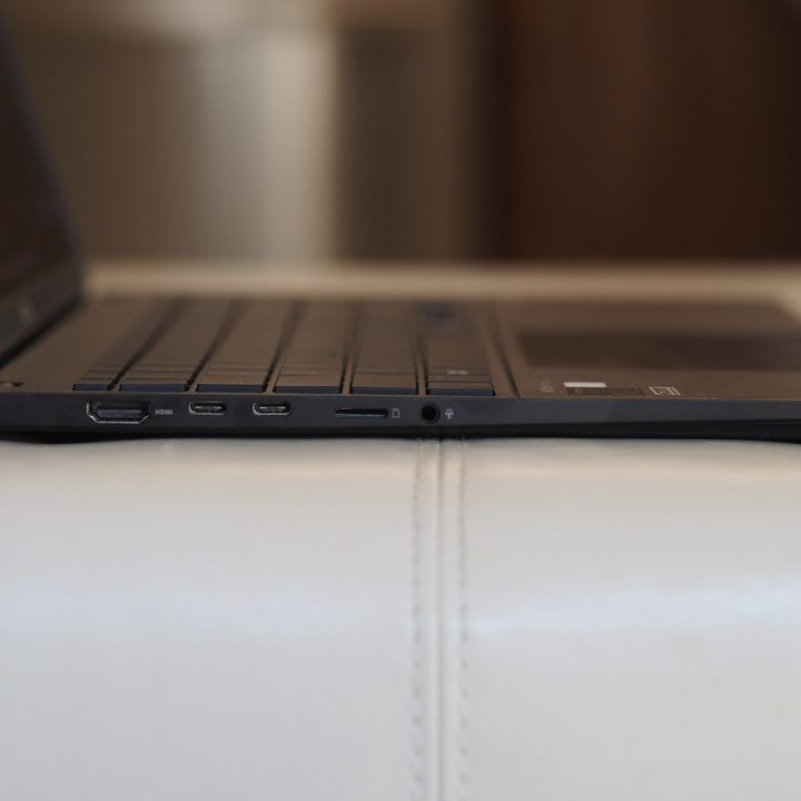 Asus Vivobook S 15 CoPilot+ side view showing ports and lid.