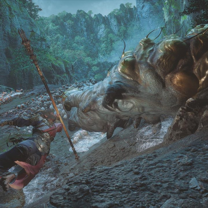 The image shows the player's character spinning around with their staff planted on the ground.
