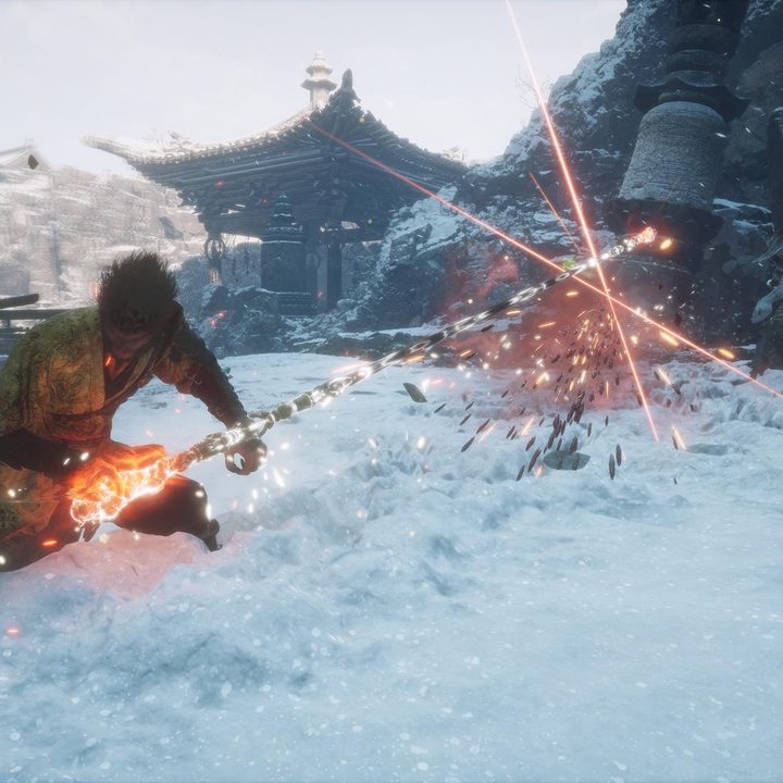 The image shows the player's character hitting a distant enemy with their staff.