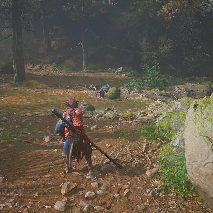 The image shows the player running toward a Skandha statue head.