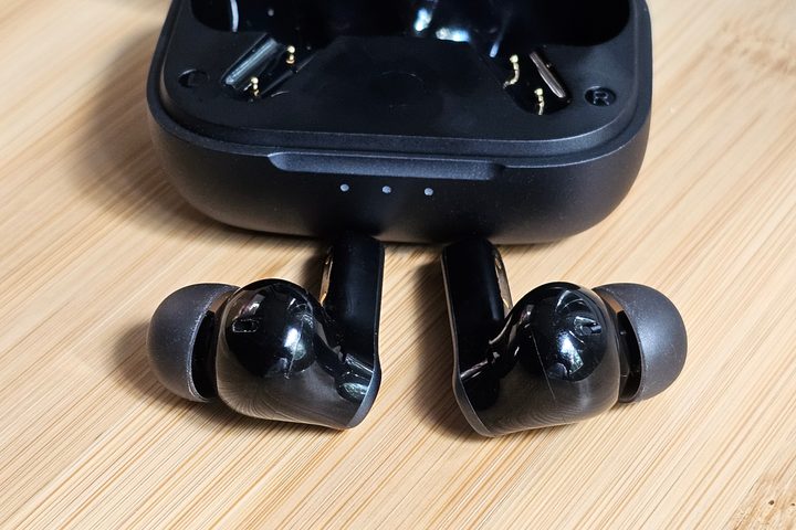 Earfun Air Pro 4 in front of case.