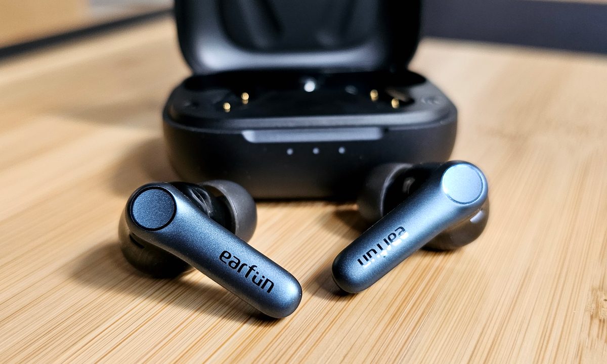 Earfun Air Pro 4 in front of case.