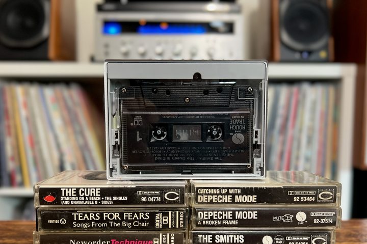 The Fiio CP13 portable cassette player with some old cassette tapes.