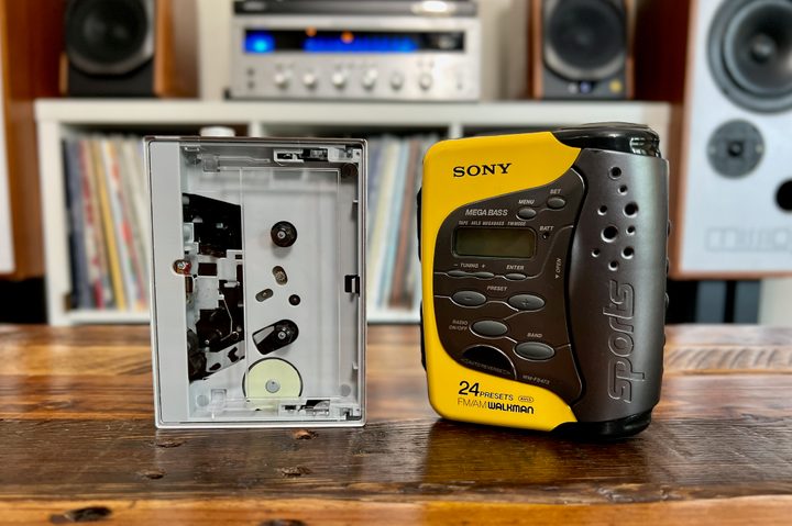 The Fiio CP13 portable cassette player alongside a Sony Sports Walkman.