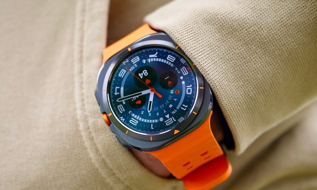 A person wearing the Samsung Galaxy Watch Ultra showing the Ultra Analogue watch face.