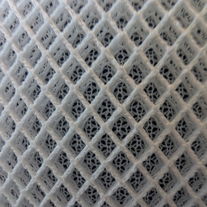 A macro photo of a HomePod mini, taken with the Google Pixel 9 Pro XL.