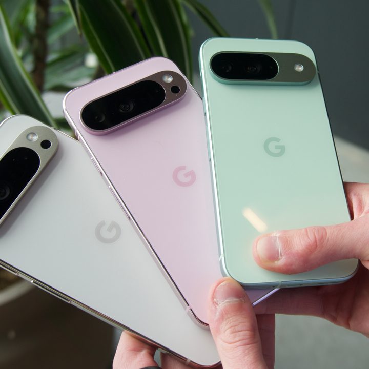 Someone holding the Google Pixel 9 Pro XL, Pixel 9 Pro, and Pixel 9.