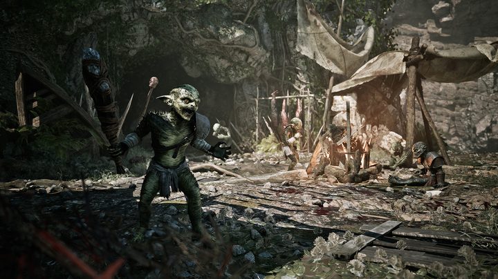 Orcs stand near a fire in Gothic 1 Remake.