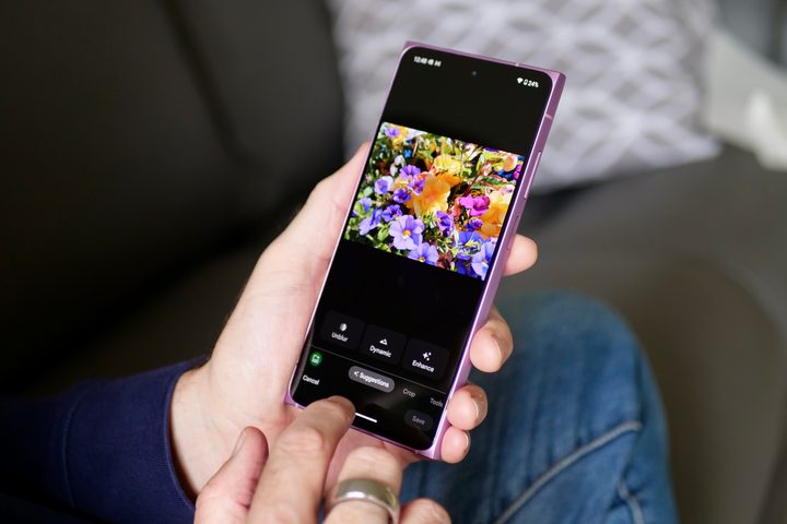 A person using the HMD Skyline's photo editing tools.