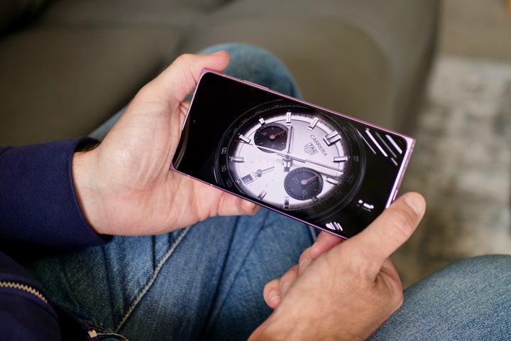 A person watching a video on the HMD Skyline.
