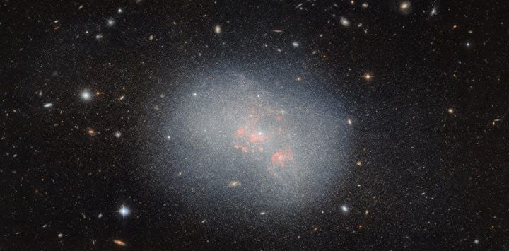 This NASA/ESA Hubble Space Telescope image captures the dwarf irregular galaxy NGC 5238.