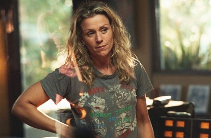 A woman leans on her side in Laurel Canyon.