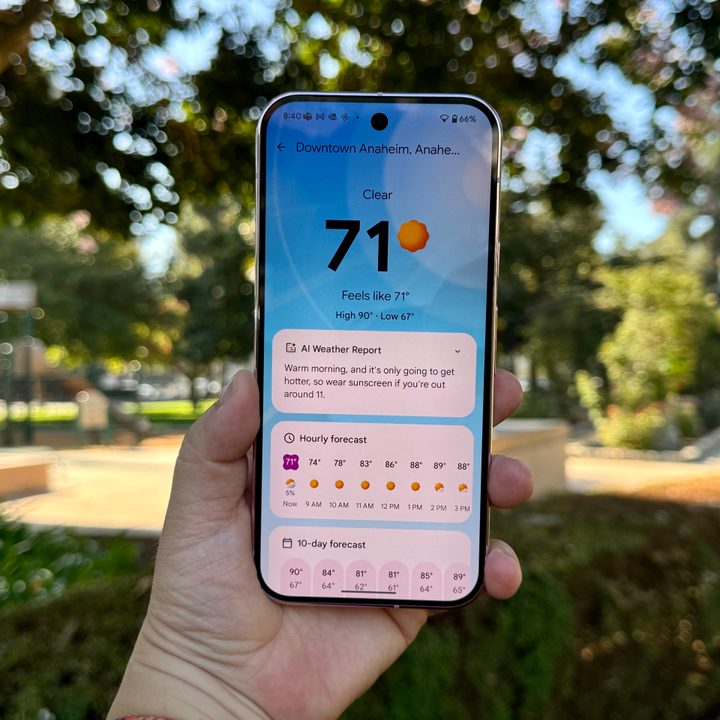 Pixel 9 Pro in Rose Quartz showing Pixel Weather.