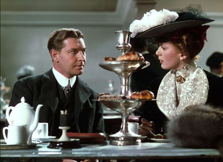 Roger Livesey and Deborah Kerr discuss the problem of anti-British propaganda in turn-of-the-century Berlin in The Life and Death of Colonel Blimp.