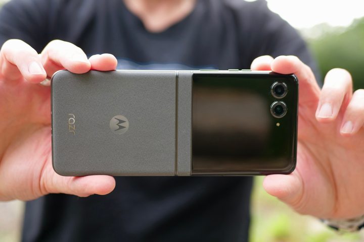 A person taking a photo with the Motorola Razr 2024.