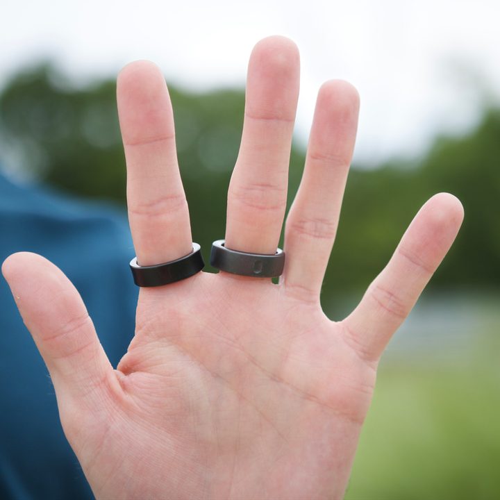 The Samsung Galaxy Ring and Oura Ring on someone's hand.