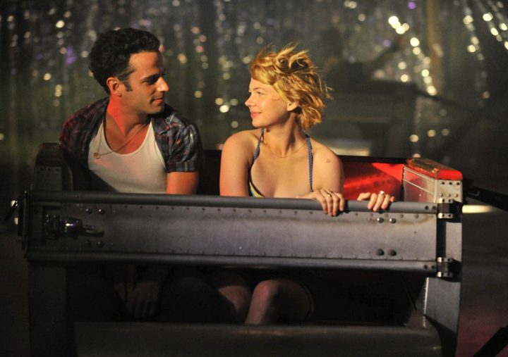 A woman looks at a man in Take This Waltz.
