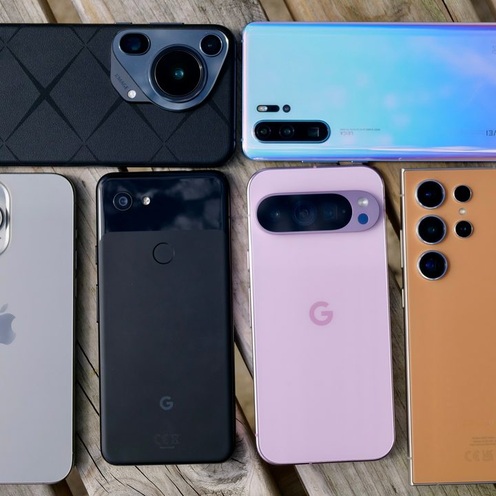 A photo showing the back of the Apple iPhone 15 Pro Max, Huawei Pura 70 Ultra, Google Pixel 3a, Google Pixel 9 Pro, Huawei P30 Pro, and the Samsung Galaxy S24 Ultra.