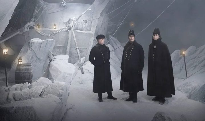 Three men stand on an iceberg in The Terror.
