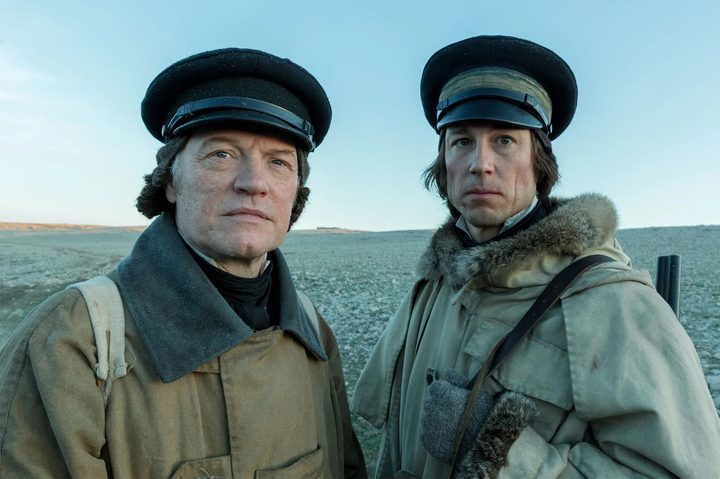 Two men look ahead in The Terror.