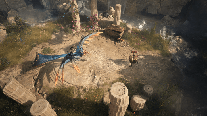 A warrior faces down a bird-like boss in Titan Quest 2.