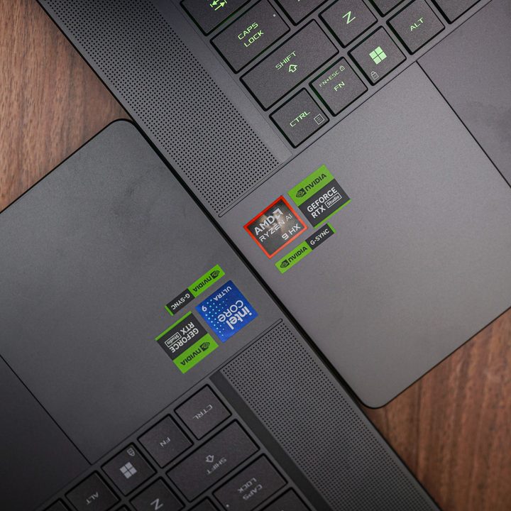 AMD and Intel logos next to each other on gaming laptops.