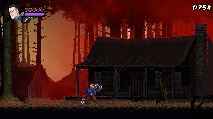 Ash from the Ash vs Evil dead series stands in front of an abandonded shack, chainsaw hand slung behind him in Ash vs Evil Dead.