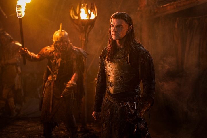 Adar stands near an orc in The Lord of the Rings: The Rings of Power season 2.