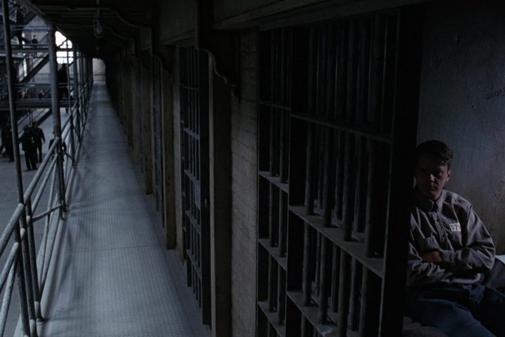 Andy Dufresne sits in his cell in The Shawshank Redemption.