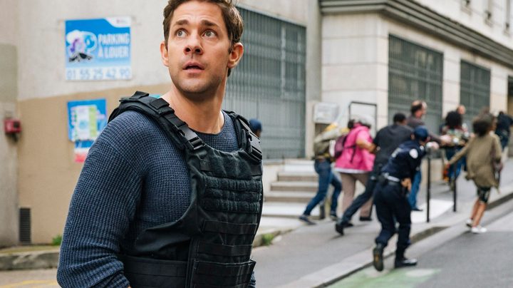 John Krasinski as Jack Ryan wearing a vest in the Prime Video adaptation.