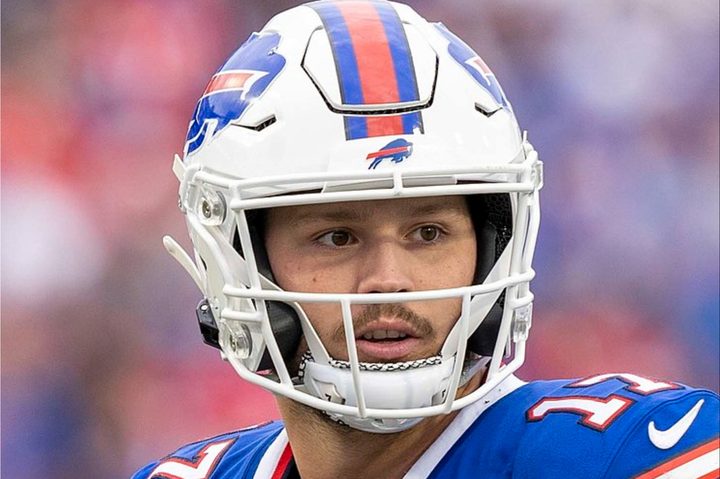 Josh Allen stares on the football field.