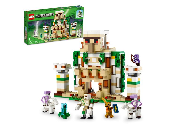 A view of the Lego Minecraft The Iron Golem Fortress set with its box in the background.