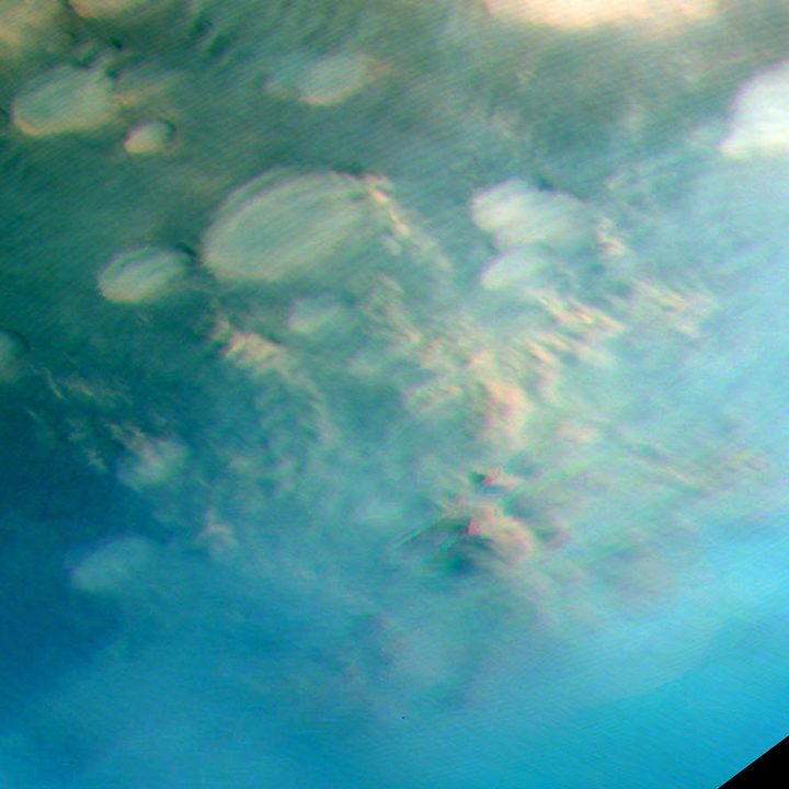 Dust lifting event. This image displays two atmospheric phenomena: the white curved lines are gravity wave clouds, while the brown areas are dust lifted from the ground by wind. The colour shift visible in the dust lifting event might be indicative of very fast winds, a phenomenon currently under investigation by other members of the team.
