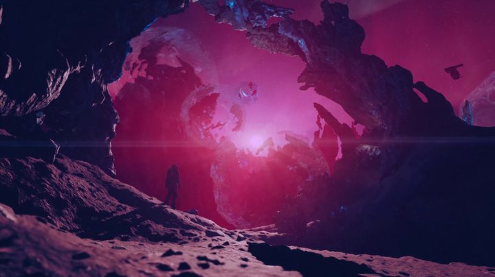 A glowing pink sky with a person standing in the middle of a natural rock archway in Starfield: Shattered Space.