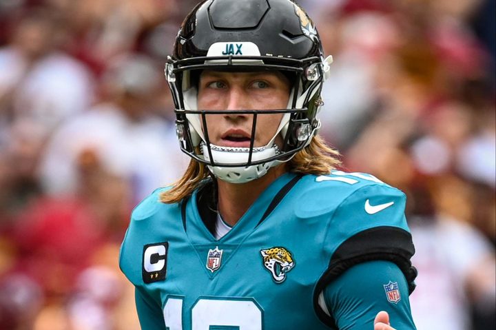 Trevor Lawrence stares on the football field.