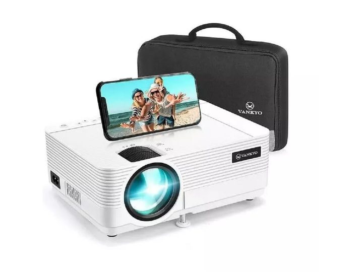 The Vankyo Leisure 470 mini projector with its bag and a phone.