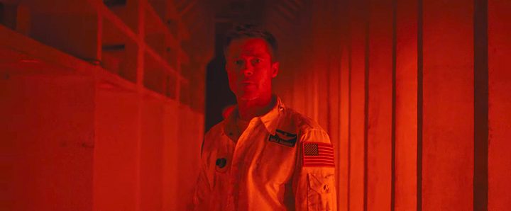 A man looks puzzled in Ad Astra.