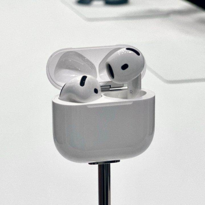 Apple AirPods 4 in charging case.