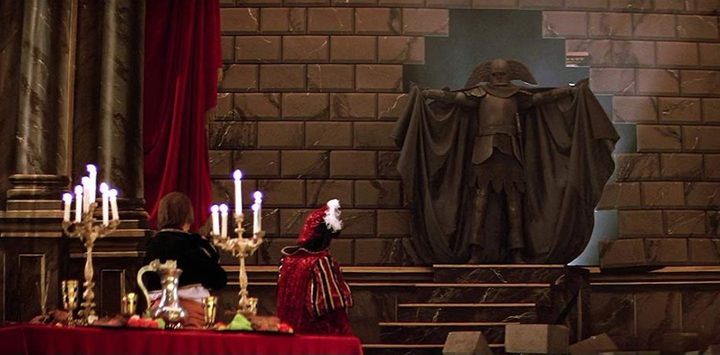A man sees a figure on stage in Amadeus.