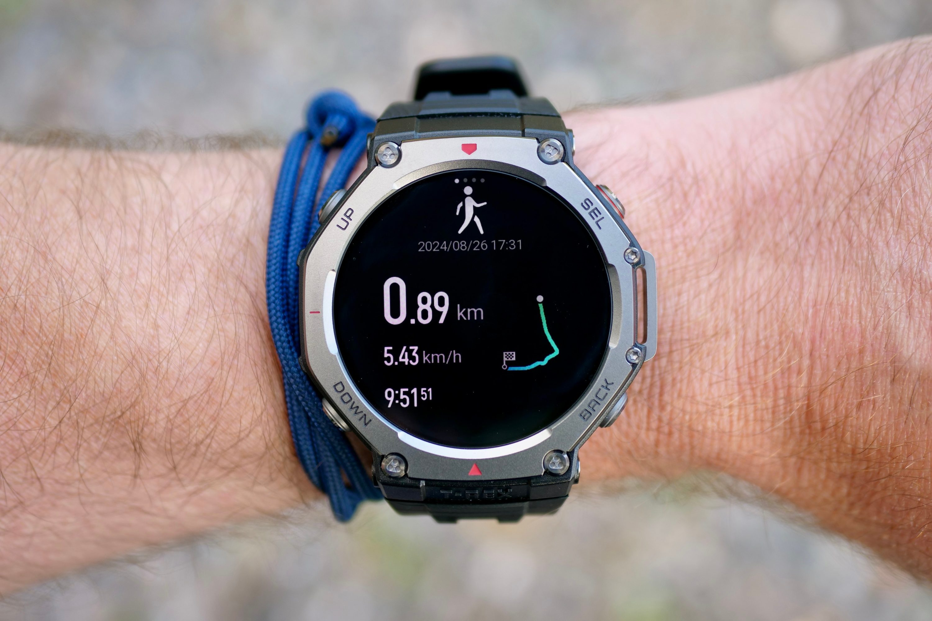 A person wearing the Amazfit T-Rex 3, showing a workout screen.