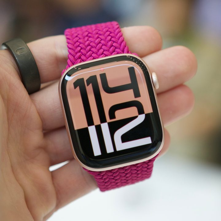 Someone holding the Apple Watch Series 10.