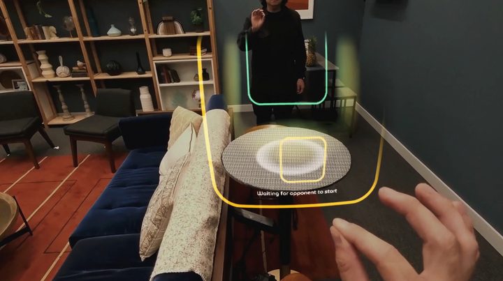 holographic pong game on Meta Orion glasses.