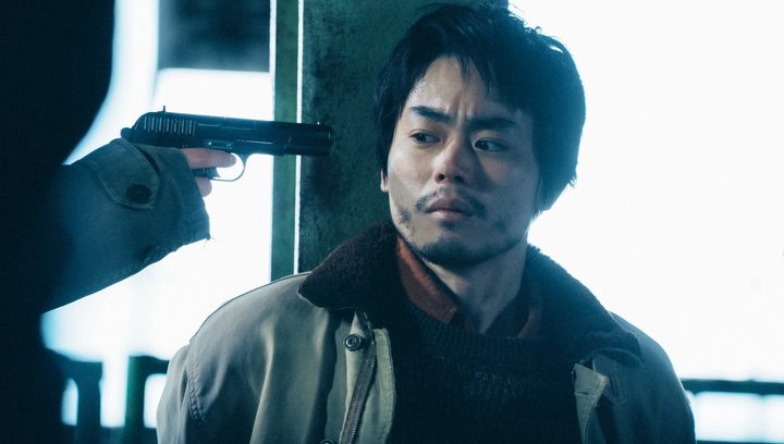 A gun is pointed at a man in Cloud.